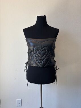 Black faux leather corset top with heart design and tie up sides